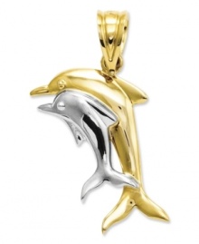 Make an extra big splash this summer. This adorable double dolphin pendant is crafted in 14k gold and sterling silver. Approximate length: 9/10 inch. Approximate width: 6/10 inch.