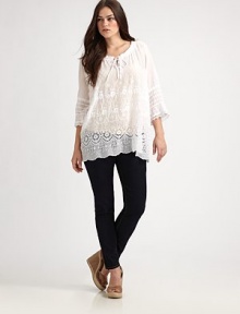 A delicate design featuring spectacular embroidery and classic eyelet details, this top has the fit and arm coverage you want.Self-tie necklineThree-quarter sleevesEmbroidered and eyelet detailsAbout 29 from shoulder to hemRayonMachine washImported A delicate design featuring spectacular embroidery and classic eyelet details, this top has the fit and arm coverage you want.Self-tie necklineThree-quarter sleevesEmbroidered and eyelet detailsAbout 29 from shoulder to hemRayonMachine washImported