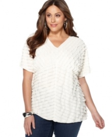 Tiered ruffles lend a romantic feel to NY Collection's short sleeve plus size top, accentuated by an empire waist.