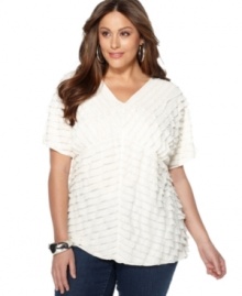 Tiered ruffles lend a romantic feel to NY Collection's short sleeve plus size top, accentuated by an empire waist. Tiered ruffles lend a romantic feel to NY Collection's short sleeve plus size top, accentuated by an empire waist.