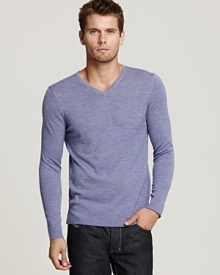 Elie Tahari offers up the Bradley, a soft, lightweight sweater with a v neck and modern fit. Elie Tahari offers up the Bradley, a soft, lightweight sweater with a v neck and modern fit.