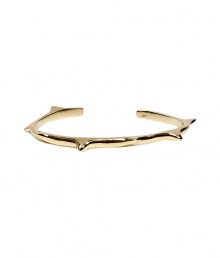 Stylish cuff bracelet made ..of fine, gold-colored brass - Narrow with cool thorn-like spikes - Casual punk attitude rocks every simple outfit - Pair with your favorite tee and jeans or with a simple daytime dress - Wear solo or stacked with multiple bangles Stylish cuff bracelet made ..of fine, gold-colored brass - Narrow with cool thorn-like spikes - Casual punk attitude rocks every simple outfit - Pair with your favorite tee and jeans or with a simple daytime dress - Wear solo or stacked with multiple bangles