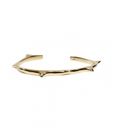 Stylish cuff bracelet made ​.​.of fine, gold-colored brass - Narrow with cool thorn-like spikes - Casual punk attitude rocks every simple outfit - Pair with your favorite tee and jeans or with a simple daytime dress - Wear solo or stacked with multiple bangles