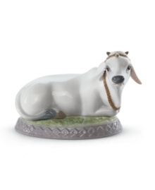 No ordinary moo cow, this handcrafted Lladro figurine puts one the world's most-sacred animals on an elegant porcelain pedestal.