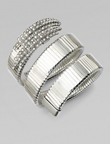 An alluring ribbed snake coils around the wrist, capped by dazzling Swarovski crystals at one end.CrystalSilverplatedDiameter, about 2¼Width, about 2¾Made in Italy An alluring ribbed snake coils around the wrist, capped by dazzling Swarovski crystals at one end.CrystalSilverplatedDiameter, about 2¼Width, about 2¾Made in Italy