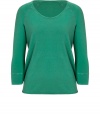 Stylishly and perfectly worn-in, this lightweight sweatshirt from James Perse is a must-have casual-cool basic  -Scoop neck, three-quarter raglan sleeves, relaxed fit - Wear with skinny jeans, harem pants, or a denim mini