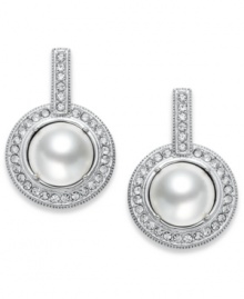 The timeless look of elegance. Eliot Danori's drop earrings feature framed simulated pearls (8 mm) with genuine mother-of-pearl coating encircled by crystals accents. Set in rhodium-plated mixed metal. Approximate diameter: 1/2 inch. The timeless look of elegance. Eliot Danori's drop earrings feature framed simulated pearls (8 mm) with genuine mother-of-pearl coating encircled by crystals accents. Set in rhodium-plated mixed metal. Approximate diameter: 1/2 inch.