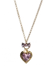 Add a little romance to your look. This flirty style by Betsey Johnson features a trendy longer chain that highlights a heart-shaped pink crystal with bow and glass pearl accents. Setting and chain crafted in antique gold tone mixed metal. Approximate length: 29-1/2 inches. Approximate drop: 2-1/4 inches. Add a little romance to your look. This flirty style by Betsey Johnson features a trendy longer chain that highlights a heart-shaped pink crystal with bow and glass pearl accents. Setting and chain crafted in antique gold tone mixed metal. Approximate length: 29-1/2 inches. Approximate drop: 2-1/4 inches.