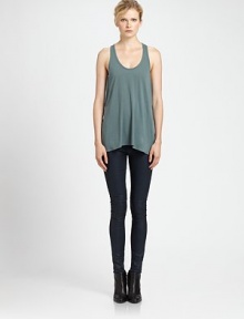 From the HELMUT capsule collection. Balance out statement pants with this soft foundation piece, enhanced by a scoopneck, sporty racerback and length that hits below the hips. ScoopneckSleevelessRacerbackLonger length hits below the hipsAbout 16 from natural waist50% modal/50% supima cottonDry cleanImportedModel shown is 5'11 (178cm) wearing US size Small. From the HELMUT capsule collection. Balance out statement pants with this soft foundation piece, enhanced by a scoopneck, sporty racerback and length that hits below the hips. ScoopneckSleevelessRacerbackLonger length hits below the hipsAbout 16 from natural waist50% modal/50% supima cottonDry cleanImportedModel shown is 5'11 (178cm) wearing US size Small.
