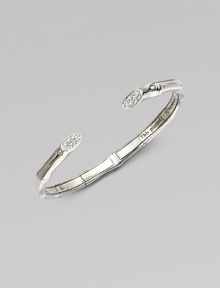 A slim cuff accented with white sapphires adorned ends. White sapphires Sterling silver Kick mechanism closure Diameter, about 2¼ Imported 