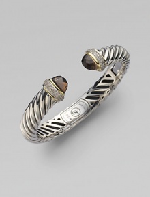 From the Waverly Collection. A sculpted cable design of sterling silver, capped with smoky quartz, and banded with 18k yellow gold and pavé diamonds.Diamonds, 0.40 tcw 18k yellow gold Sterling silver Cable, 10mm Diameter, about 2¼ Hinge clasp Imported From the Waverly Collection. A sculpted cable design of sterling silver, capped with smoky quartz, and banded with 18k yellow gold and pavé diamonds.Diamonds, 0.40 tcw 18k yellow gold Sterling silver Cable, 10mm Diameter, about 2¼ Hinge clasp Imported