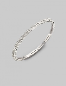 EXCLUSIVELY AT SAKS. A delicate design, offering two rows of small crystal solitaires with larger ones stationed along the slender bangle. Crystal Rhodium plated Diameter, about 2½ Hinged with push-lock clasp Imported Please note: Bracelets sold separately. EXCLUSIVELY AT SAKS. A delicate design, offering two rows of small crystal solitaires with larger ones stationed along the slender bangle. Crystal Rhodium plated Diameter, about 2½ Hinged with push-lock clasp Imported Please note: Bracelets sold separately.