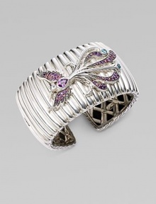 A substantial textural cuff adorned with a bird encrusted in amethyst, rhodolite and Swiss blue topaz. Sterling silver Amethyst Rhodolite Swiss blue topaz Kick mechanism closure Diameter, about 2½ Width, about 1½ Imported A substantial textural cuff adorned with a bird encrusted in amethyst, rhodolite and Swiss blue topaz. Sterling silver Amethyst Rhodolite Swiss blue topaz Kick mechanism closure Diameter, about 2½ Width, about 1½ Imported