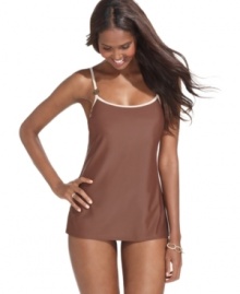 A clean-lined silhouette and chic logo details set this MICHAEL Michael Kors swimdress apart from the rest! A clean-lined silhouette and chic logo details set this MICHAEL Michael Kors swimdress apart from the rest!