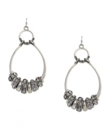 Hip hoop hooray! Featuring a unique oval double-drop silhouette, Jessica Simpson's earrings will stand out as a trendy addition to your wardrobe. Embellished with glittering glass accents, they're set in silver tone mixed metal. Approximate drop: 3 inches. Hip hoop hooray! Featuring a unique oval double-drop silhouette, Jessica Simpson's earrings will stand out as a trendy addition to your wardrobe. Embellished with glittering glass accents, they're set in silver tone mixed metal. Approximate drop: 3 inches.