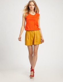 A bold hue and an asymmetrical hem make this silk top a fashion-forward favorite.Scoop neckSleevelessHi-lo hemAbout 33 from shoulder to hem93% silk/7% elastaneDry cleanImported A bold hue and an asymmetrical hem make this silk top a fashion-forward favorite.Scoop neckSleevelessHi-lo hemAbout 33 from shoulder to hem93% silk/7% elastaneDry cleanImported