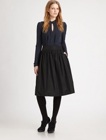 An alluring keyhole detail and pleated bib dress up this matte jersey style.Band collar with button closuresFront keyholePleated bibShoulder gathersFully linedViscoseDry cleanImportedModel shown is 5'10 (177cm) wearing US size Small. An alluring keyhole detail and pleated bib dress up this matte jersey style.Band collar with button closuresFront keyholePleated bibShoulder gathersFully linedViscoseDry cleanImportedModel shown is 5'10 (177cm) wearing US size Small.