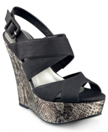 Get into the beauty of this eye-catching platform. G by GUESS' Deedra platform wedge sandals will give your look an instant upgrade. Get into the beauty of this eye-catching platform. G by GUESS' Deedra platform wedge sandals will give your look an instant upgrade.