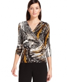A feather-inspired print adorns this faux-wrap style top from Calvin Klein, sure to add a fashionable flourish to a pair of black pants or a pencil skirt. (Clearance) A feather-inspired print adorns this faux-wrap style top from Calvin Klein, sure to add a fashionable flourish to a pair of black pants or a pencil skirt. (Clearance)