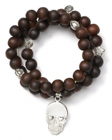 Bold and oh so bohemian, this set of beaded bracelets from Good Charma is ready to start an arm party. Stack these wooded beauties up to accent the tough-chic sterling silver skull charm. Bold and oh so bohemian, this set of beaded bracelets from Good Charma is ready to start an arm party. Stack these wooded beauties up to accent the tough-chic sterling silver skull charm.