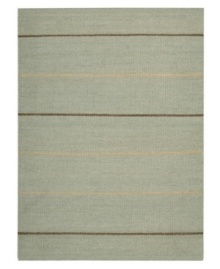 Subtle striping gives way to understated sophistication in the Horizon area rug from Calvin Klein. Generously thick wool fibers are hand tufted in India for remarkable strength and detailed design. Perfect for mixing with any style decor.