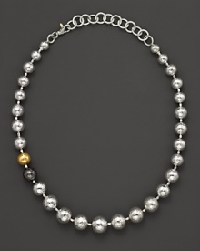 Warm up your look this season in Gurhan's balloon necklace, crafted from hammered orbs in white silver, dark silver and gleaming 24 Kt. yellow gold. Warm up your look this season in Gurhan's balloon necklace, crafted from hammered orbs in white silver, dark silver and gleaming 24 Kt. yellow gold.