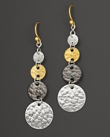 Blending tones of white silver, dark silver and 24 Kt. yellow gold, this triple-drop earring from Gurhan is crafted with flat discs of hammered silver with yellow gold French wire backs. Blending tones of white silver, dark silver and 24 Kt. yellow gold, this triple-drop earring from Gurhan is crafted with flat discs of hammered silver with yellow gold French wire backs.