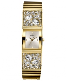 Golden glam, by GUESS. This stunning watch from GUESS flaunts a gold tone bangle bejeweled with sparkling crystals. Golden glam, by GUESS. This stunning watch from GUESS flaunts a gold tone bangle bejeweled with sparkling crystals.