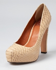 A luxurious detail that never goes out of style--luxe, snakeskin embossed leather takes center stage on Pour La Victoire's Irinia II platform pumps. A luxurious detail that never goes out of style--luxe, snakeskin embossed leather takes center stage on Pour La Victoire's Irinia II platform pumps.