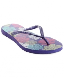 Pretty florals and bright colors are the picture of summer. The slim Allegra thong sandals by Havaianas feature a metallic thong strap that adds extra shine. Pretty florals and bright colors are the picture of summer. The slim Allegra thong sandals by Havaianas feature a metallic thong strap that adds extra shine.