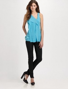 An updated twist on the silk tank, finished with an asymmetrical neckline and ruffled front.SleevelessRuffled bodiceCenter back zipperAbout 27 from shoulder to hemSilk/polyester/rayonDry cleanImportedModel shown is 5'9 (175cm) wearing US size Small. An updated twist on the silk tank, finished with an asymmetrical neckline and ruffled front.SleevelessRuffled bodiceCenter back zipperAbout 27 from shoulder to hemSilk/polyester/rayonDry cleanImportedModel shown is 5'9 (175cm) wearing US size Small.