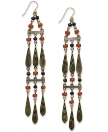 Drop in on modern fashion with these chandelier earrings from Lauren Ralph Lauren. Rows of beads create a dramatic look. Crafted in gold tone mixed metal. Approximate drop: 4-3/4 inches. Drop in on modern fashion with these chandelier earrings from Lauren Ralph Lauren. Rows of beads create a dramatic look. Crafted in gold tone mixed metal. Approximate drop: 4-3/4 inches.