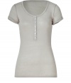 Stylish T-shirt made ​.​.of lightweight, beige linen - Fashionable Henley-cut with wide, round neck, button placket and short cap sleeves -  Silhouette is narrow and perfect for layering - Essential basic that can be worn solo or as an undershirt - Pair with favorite jeans, pleated skirt or crisp chinos
