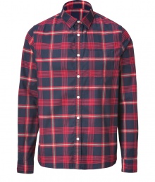 Rugged looks get a cool finish in Woolrichs red and navy plaid button-down - Classic cut, buttoned cuffs, breast pocket, shirttail hemline - Team with jeans and rugged boots Rugged looks get a cool finish in Woolrichs red and navy plaid button-down - Classic cut, buttoned cuffs, breast pocket, shirttail hemline - Team with jeans and rugged boots