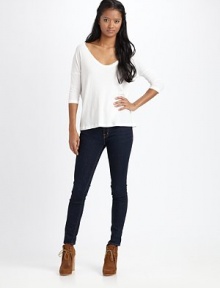 Cotton-rich v-neck with dropped shoulders, three-quarter dolman sleeves and a boxy silhouette. Rounded v-neckDropped shouldersThree-quarter dolman sleeves91% cotton/9% elastaneMachine washMade in USA of Italian fabric Cotton-rich v-neck with dropped shoulders, three-quarter dolman sleeves and a boxy silhouette. Rounded v-neckDropped shouldersThree-quarter dolman sleeves91% cotton/9% elastaneMachine washMade in USA of Italian fabric