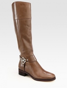 Casual leather staple with a western-inspired harness and shiny gold metal hardware. Stacked heel, 1¼ (30mm)Stacked platform, ½ (15mm)Compares to a ¾ heel (20mm)Leather upperSide zipLeather lining and solePadded insoleImported Casual leather staple with a western-inspired harness and shiny gold metal hardware. Stacked heel, 1¼ (30mm)Stacked platform, ½ (15mm)Compares to a ¾ heel (20mm)Leather upperSide zipLeather lining and solePadded insoleImported