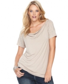 What a stud: metallic embellishments add an edgy air to a softly draped plus size top from INC. What a stud: metallic embellishments add an edgy air to a softly draped plus size top from INC.