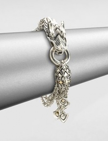From the Naga Collection. A bold dragon head and tail are connected by delicate chains dangling crest-shaped charms in this visionary and witty design.Sterling silver and 18k yellow goldLength, about 7.75Dragon head and ring hinged claspMade in Bali From the Naga Collection. A bold dragon head and tail are connected by delicate chains dangling crest-shaped charms in this visionary and witty design.Sterling silver and 18k yellow goldLength, about 7.75Dragon head and ring hinged claspMade in Bali