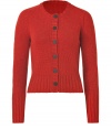 Building a coveted capsule wardrobe is easy with stylish staples like Iris von Arnims paprika-hued cardigan - Sumptuously soft in a luxe cashmere knit - Fitted, feminine cut tapers gently through waist and hits at hips - Round neck, long sleeves and full button placket - Oversize rib trim at cuffs, collar and hem - Versatile and classically chic, seamlessly transitions from work to weekend - Pair with everything from suit trousers and pencil skirts to skinny denim and leather pants