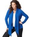 Add a cozy layer to your look with INC's long sleeve plus size cardigan, highlighted by an asymmetrical hem. (Clearance)