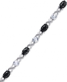 Embrace some glamour now and then. This pretty crisscross patterned bracelet highlights oval-cut onyx (3-1/3 ct. t.w.), round-cut white topaz (2-3/8 ct. t.w.) and sparkling diamond accents. Approximate length: 7-1/2 inches. Embrace some glamour now and then. This pretty crisscross patterned bracelet highlights oval-cut onyx (3-1/3 ct. t.w.), round-cut white topaz (2-3/8 ct. t.w.) and sparkling diamond accents. Approximate length: 7-1/2 inches.