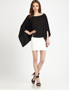 Semi-sheer back and emphasized poncho sleeves rejuvenate this lovely, lightweight design. BoatneckLong poncho sleevesSemi-sheer backPolyesterDry cleanImportedModel shown is 5'10 (177cm) wearing US size XS/S. Semi-sheer back and emphasized poncho sleeves rejuvenate this lovely, lightweight design. BoatneckLong poncho sleevesSemi-sheer backPolyesterDry cleanImportedModel shown is 5'10 (177cm) wearing US size XS/S.