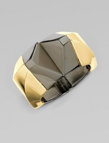 A shiny, two-tone geometric design for a futuristic look. BrassDiameter, about 2Hinged closureMade in Italy A shiny, two-tone geometric design for a futuristic look. BrassDiameter, about 2Hinged closureMade in Italy
