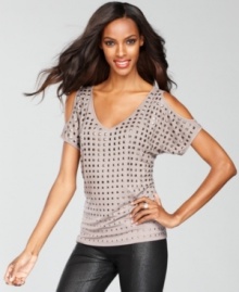 Sexy cutouts and edgy studs create a unique combination of tough and tender on INC's party-ready top! Sexy cutouts and edgy studs create a unique combination of tough and tender on INC's party-ready top!