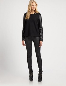 Buttery leather sleeves add unmistakable style to this crewneck wool top.CrewneckLong sleevesExposed back zipperBack yokeAbout 24 from shoulder to hemBody: woolSleeves: lambskin leatherDry clean by leather specialistImportedSIZE & FIT Model shown is 5'10½ (179cm) wearing a US size Small. Buttery leather sleeves add unmistakable style to this crewneck wool top.CrewneckLong sleevesExposed back zipperBack yokeAbout 24 from shoulder to hemBody: woolSleeves: lambskin leatherDry clean by leather specialistImportedSIZE & FIT Model shown is 5'10½ (179cm) wearing a US size Small.