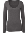Effortlessly feminine, this super soft long sleeve tee from Majestic is a new-season must-have basic - Scooped neckline, long sleeves, stitched trim - Loosely fitted - Pair with printed skinny jeans, a boyfriend blazer, and ankle booties