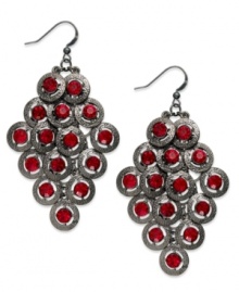 Warm up this season with red hues and dusky color. These drop earrings from Style&co. features hematite tone discs and red-colored glass crystals. Crafted in hematite tone mixed metal. Approximate drop: 3 inches. Warm up this season with red hues and dusky color. These drop earrings from Style&co. features hematite tone discs and red-colored glass crystals. Crafted in hematite tone mixed metal. Approximate drop: 3 inches.