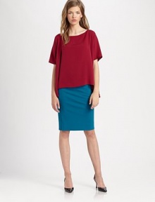 An easy way to achieve that relaxed, contemporary aesthetic, this woven silk top has dropped shoulders and an asymmetrical hem. BoatneckDropped shouldersShort sleevesAsymmetrical hemWoven silkDry cleanImportedModel shown is 5'9 (175cm) wearing US size Extra Small/Small. An easy way to achieve that relaxed, contemporary aesthetic, this woven silk top has dropped shoulders and an asymmetrical hem. BoatneckDropped shouldersShort sleevesAsymmetrical hemWoven silkDry cleanImportedModel shown is 5'9 (175cm) wearing US size Extra Small/Small.