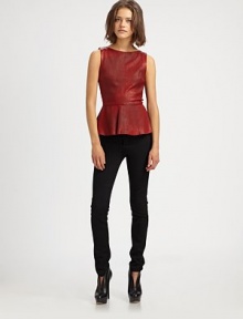 Featuring hot-right-now peplum, a silk-lined, butter-soft leather top with undeniable appeal.Round neckSleevelessPeplum hemBack zipperAbout 24 from shoulder to hemBody: lambskin leatherLining: silkDry clean by leather specialistImportedSIZE & FIT Model shown is 5'10 (177cm) wearing a US size Small. Featuring hot-right-now peplum, a silk-lined, butter-soft leather top with undeniable appeal.Round neckSleevelessPeplum hemBack zipperAbout 24 from shoulder to hemBody: lambskin leatherLining: silkDry clean by leather specialistImportedSIZE & FIT Model shown is 5'10 (177cm) wearing a US size Small.