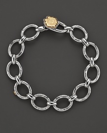 Classic Tacori style, in sterling silver links with a 18K yellow gold logo toggle clasp. Classic Tacori style, in sterling silver links with a 18K yellow gold logo toggle clasp.